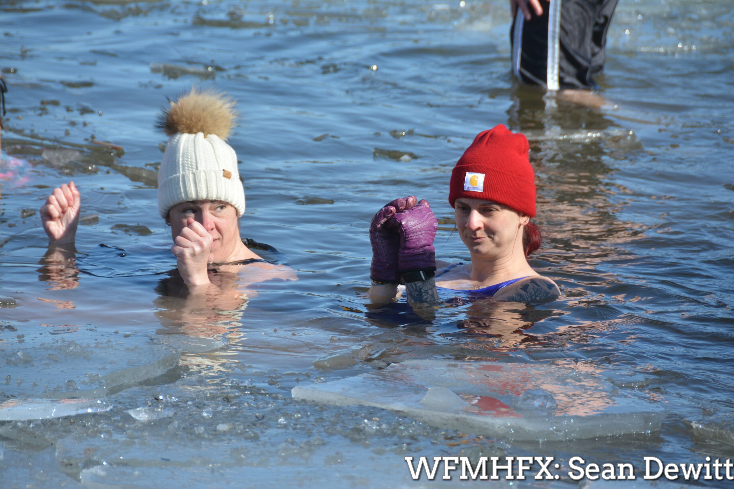 Dozens of dippers took an icy plunge into a lake in Dartmouth earlier –  Waterfront Media Halifax